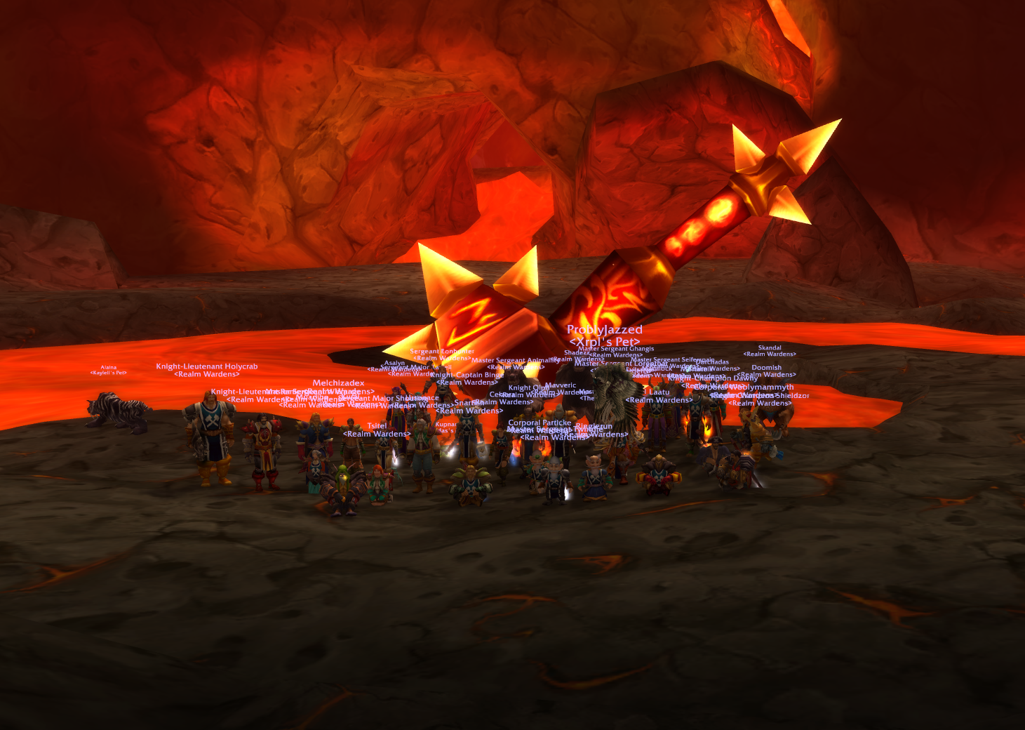 A group fighting in a cave with lava